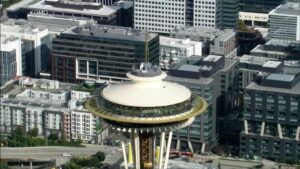 WATCH:  Daredevils scale and jump from Space Needle in Seattle